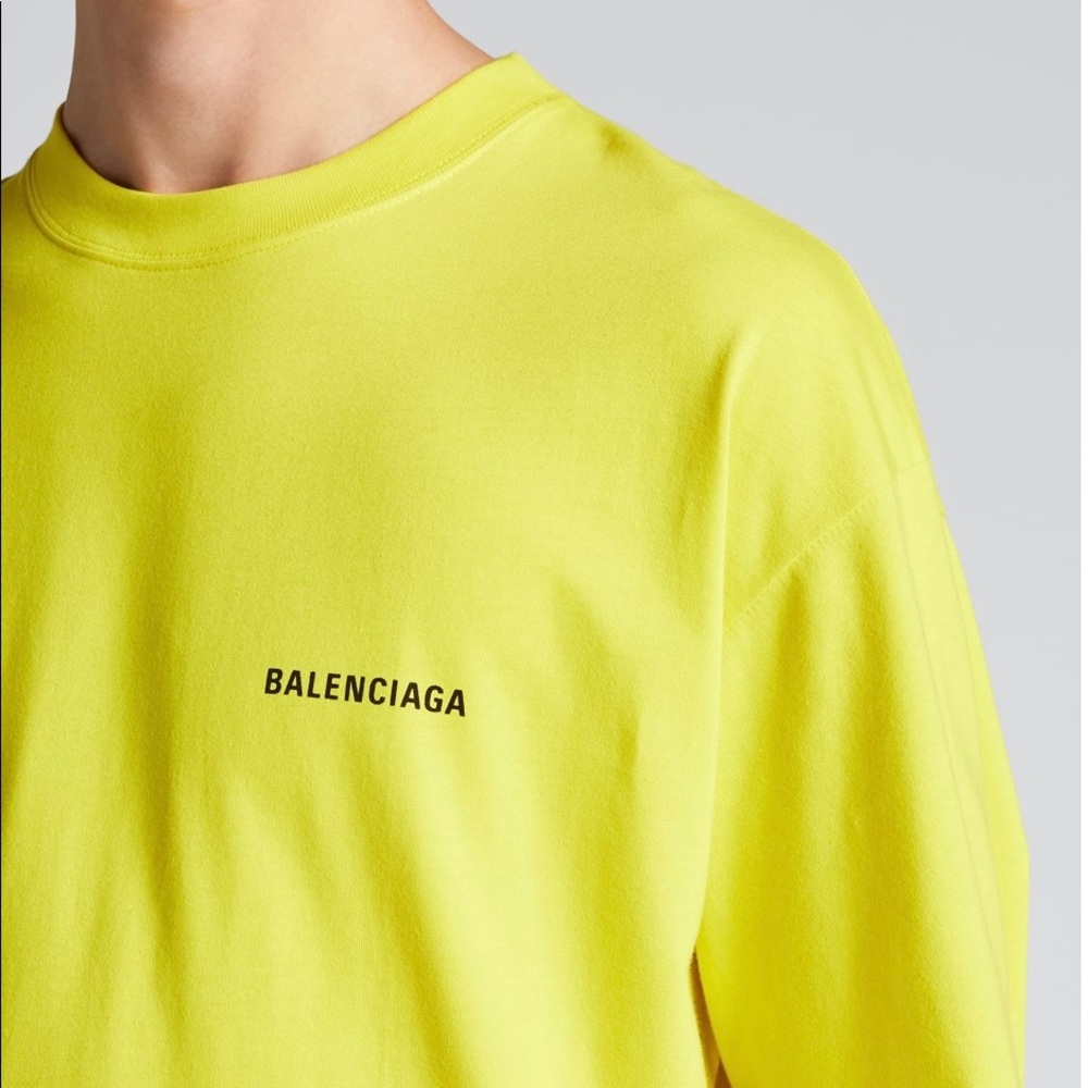 Balenciaga "Copyright" T-shirt with logo print at chest and back. Yellow.